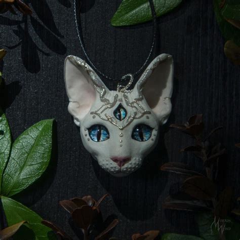 Fearful feline talisman pendant